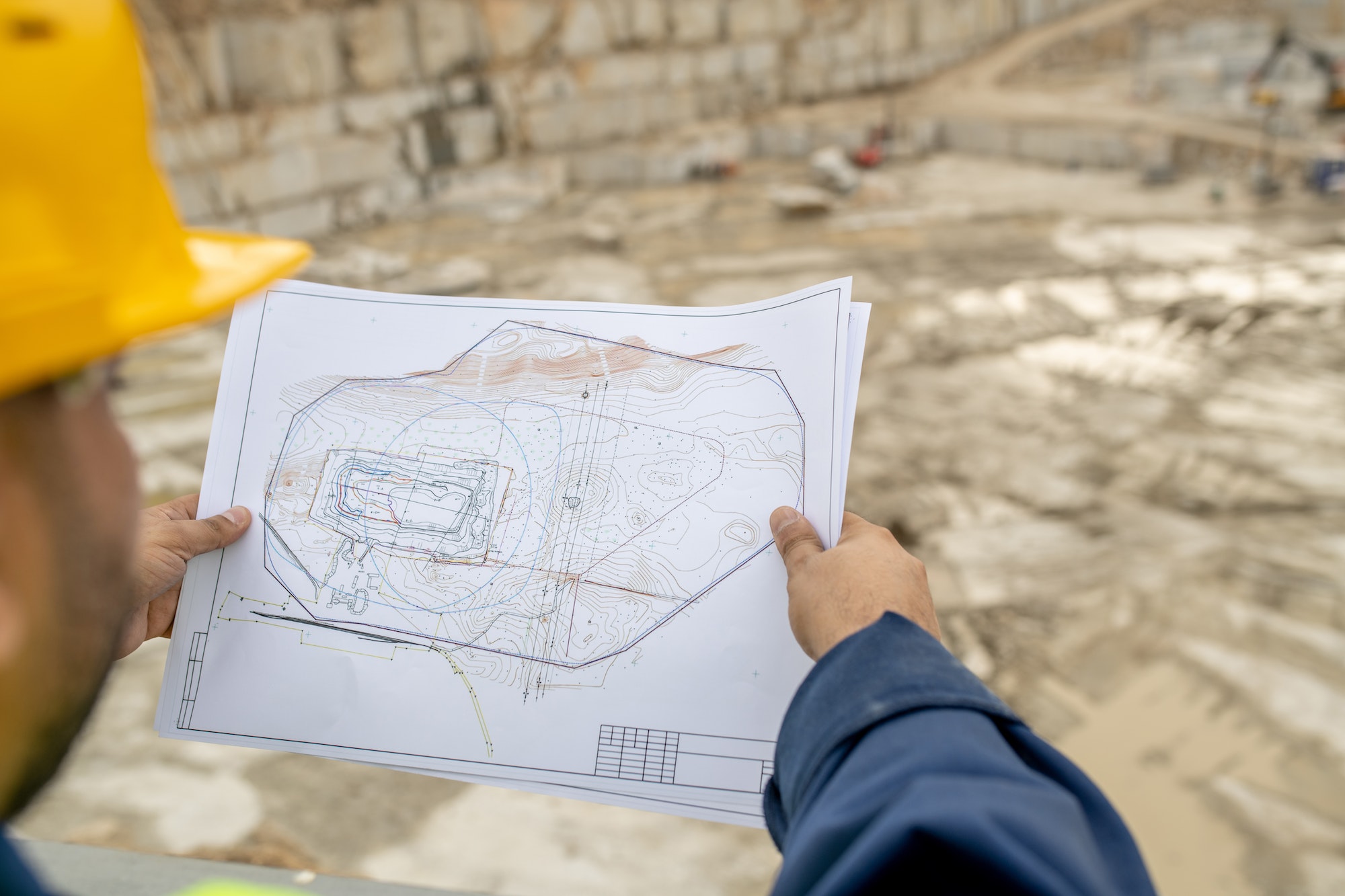 Drawing of construction in hands of builder